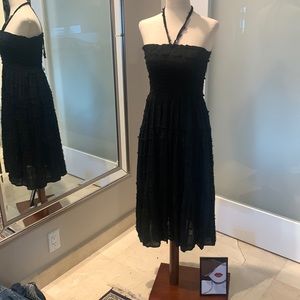 Black sundress with frayed ruched fabric. New with tags.
